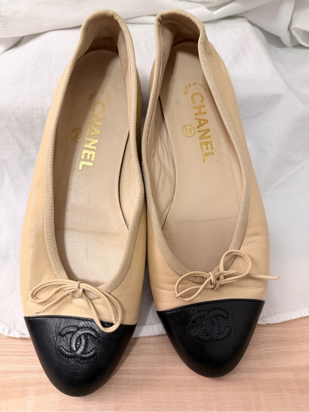 CHANEL Beige Leather Ballet Flats with Black Cap Toe